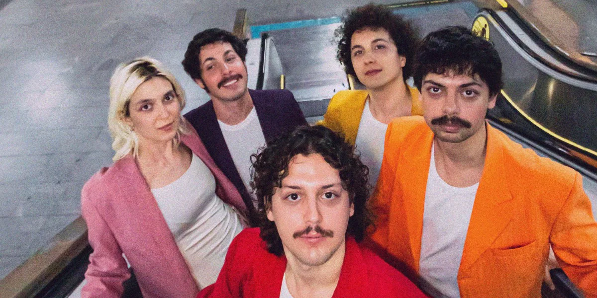 Banner promocional da banda Miniguini & os últimos românticos